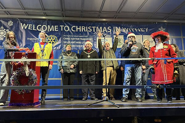 If you're struggling to spot me in the line-up, just look for the person most excited by Christmas lights!